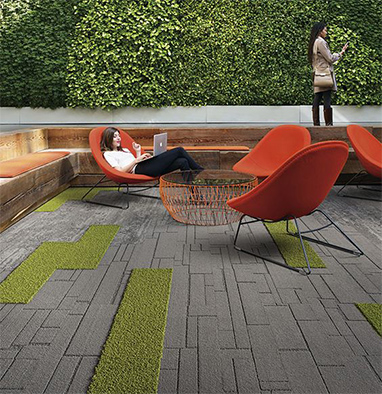 People at work lounging outside in outdoor office space with minimal design