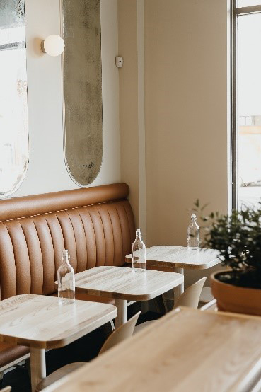 Gray Olive Cafeteria in Vancouver, customer seating area, retail interior design finishes by Cutler