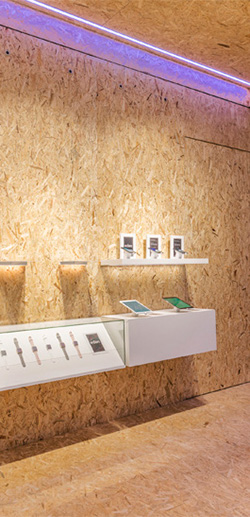 Exposed retail brick and mortar interior with product display and familiar retail details