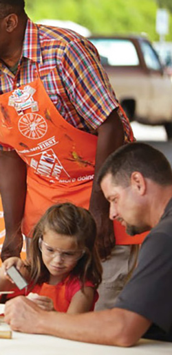 A stillshot of a home depot ad showing emotional connection tied to branding design
