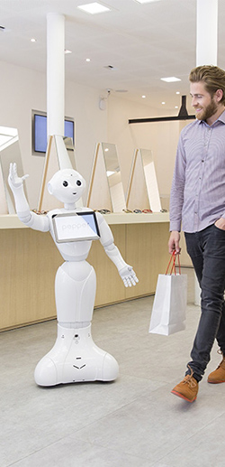 A retail brand experience that includes AI and Robots helping a customer to shop