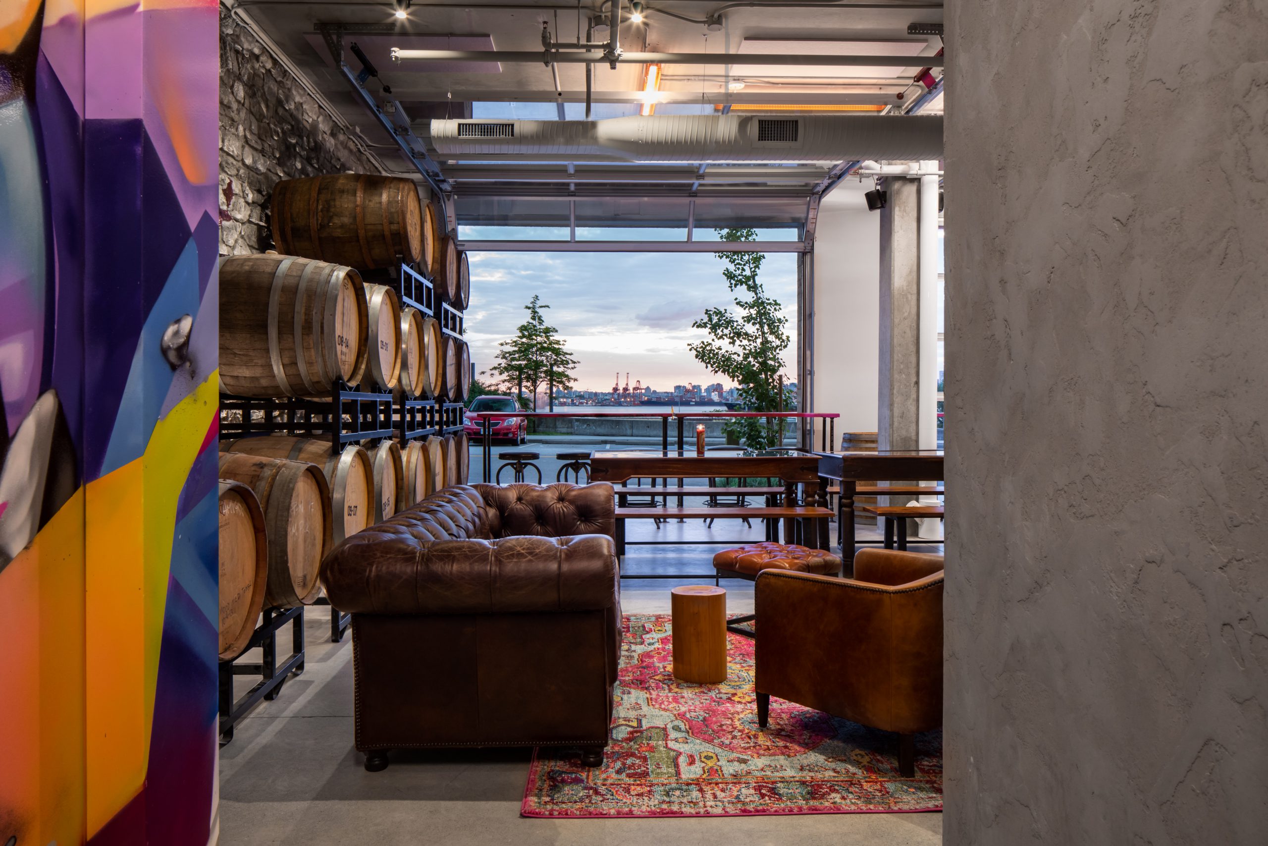 bar with open garage and lounge, Bar Interior Design, House of Funk Brewery in North Vancouver BC, by Cutler