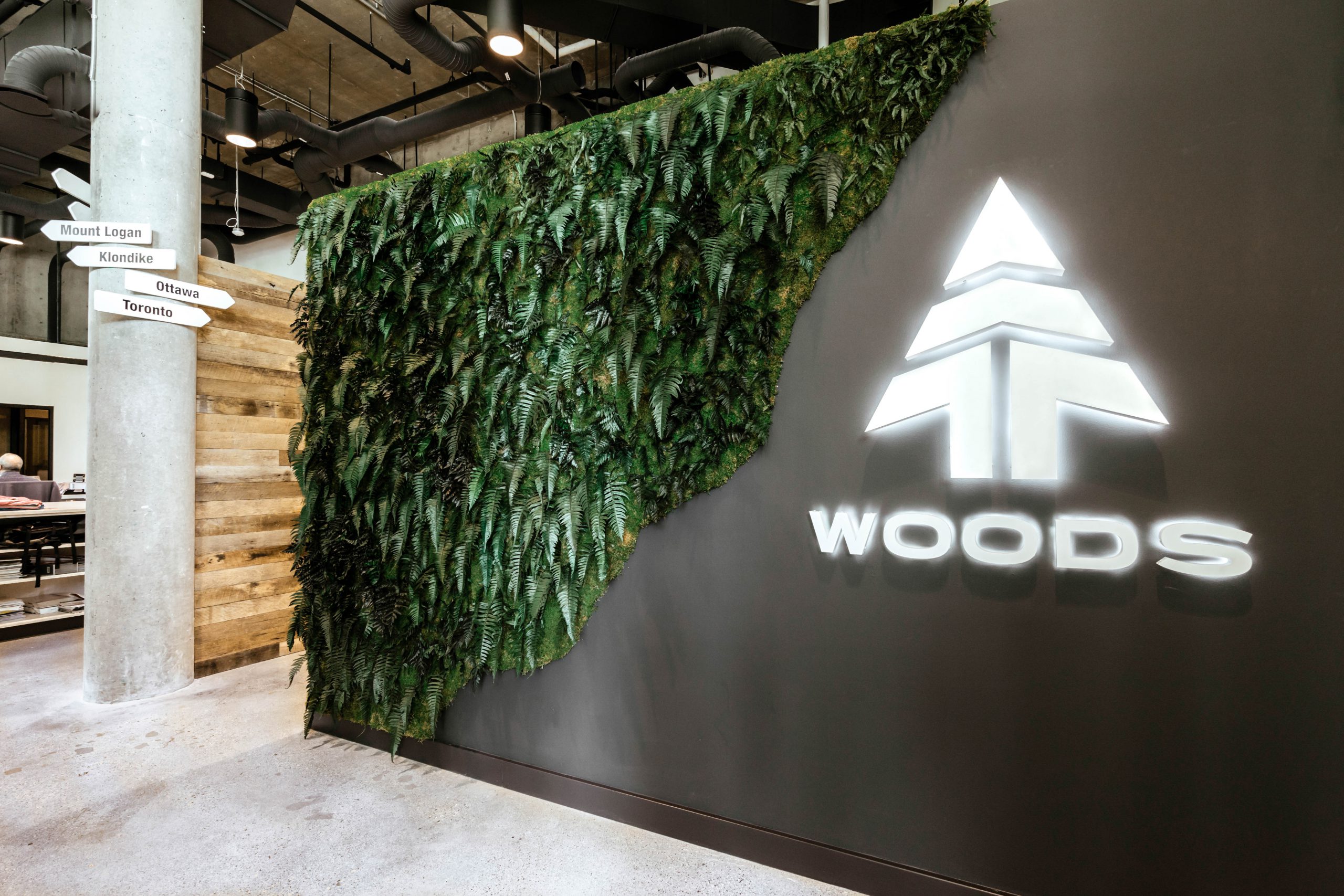 Woods Product Development Lab in Vancouver BC Showroom Design Branded Wall by Cutler