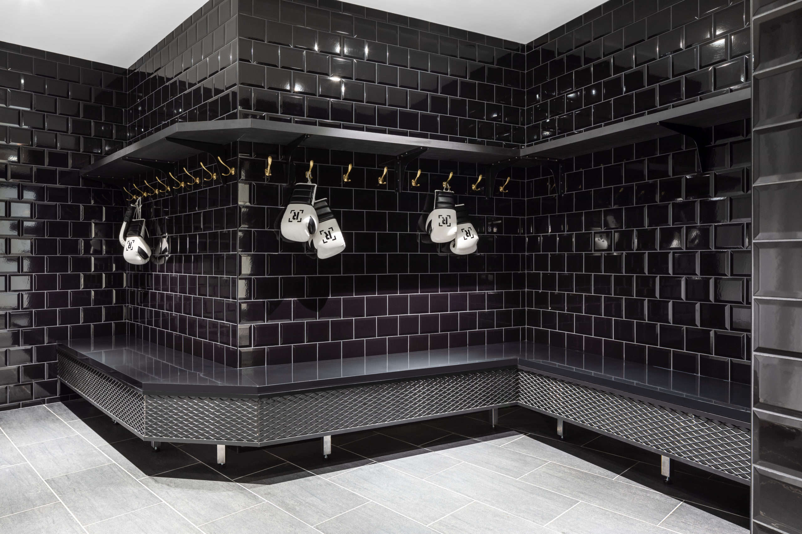 Rumble Boxing Studio in Vancouver  BC Fitness & Gym Design Bathroom and shower wall design by Cutler