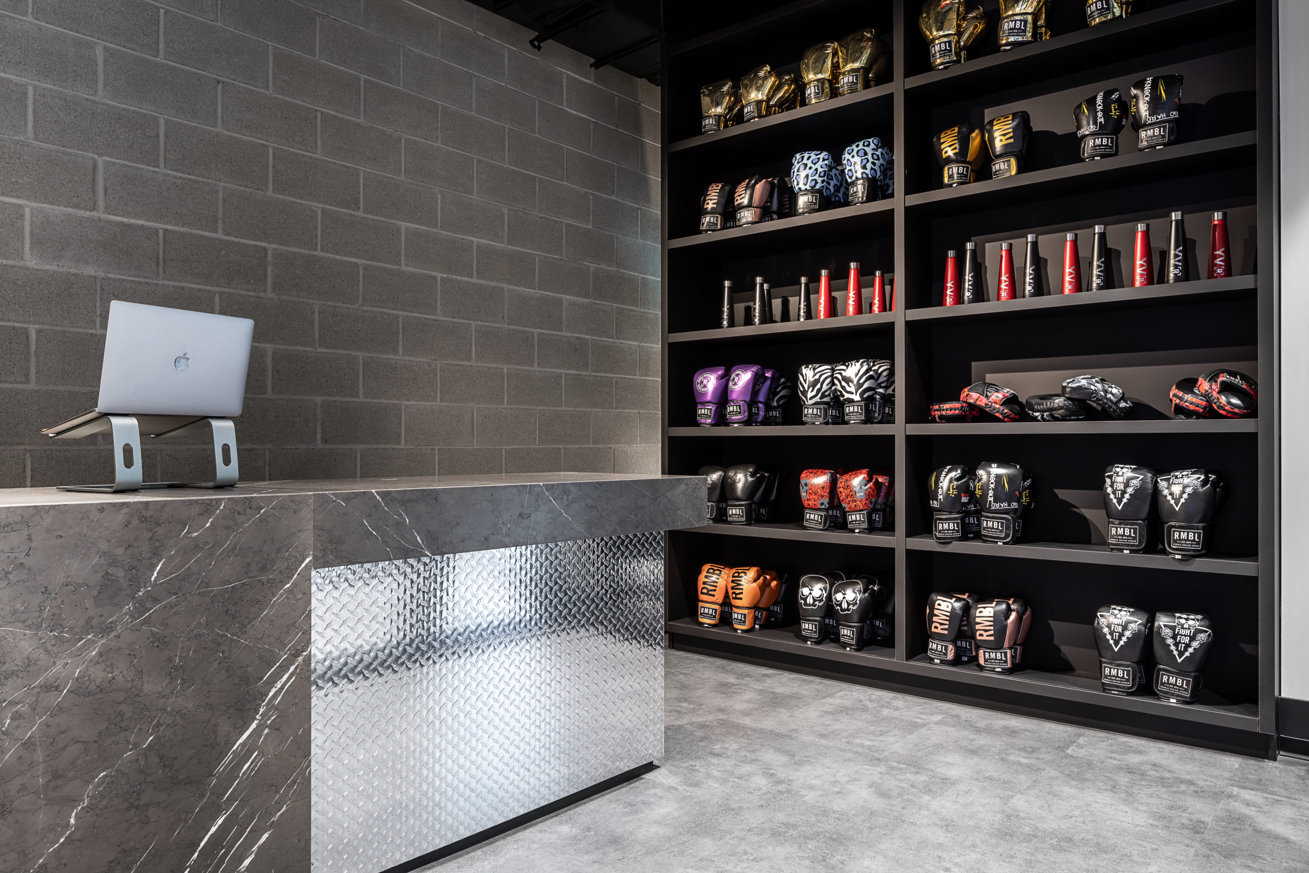 Rumble Boxing Studio in Vancouver  BC Fitness & Gym Design Gym check-in interior design by Cutler